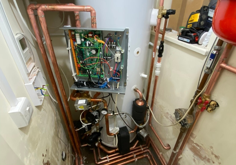 Heating control panel wired out alongside a cylinder, pump and expansion vessel